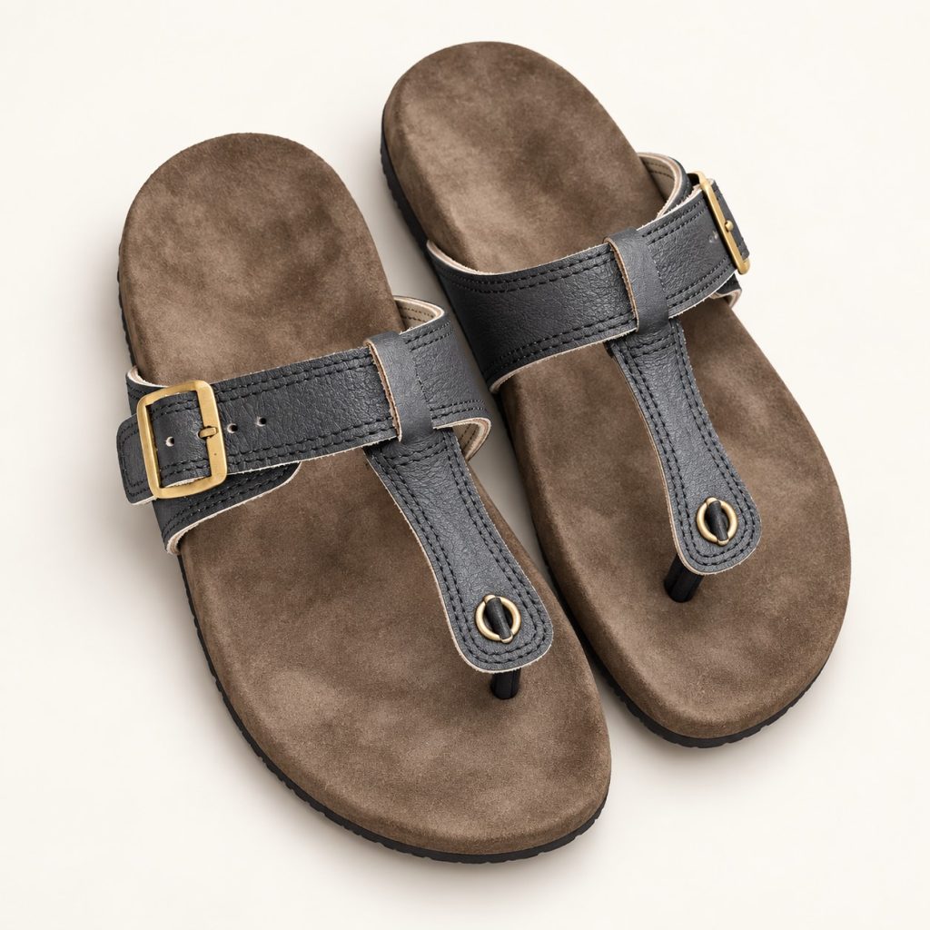 Pair of charcoal toe-post sandals with stitched straps and side buckles
